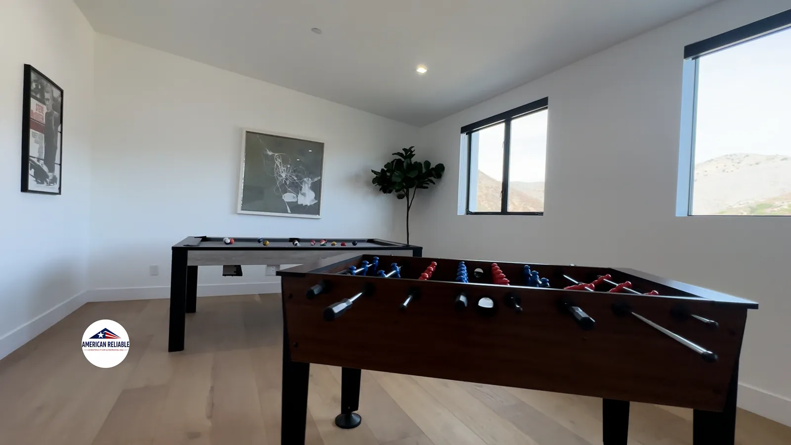 Game room with entertainment setup and views