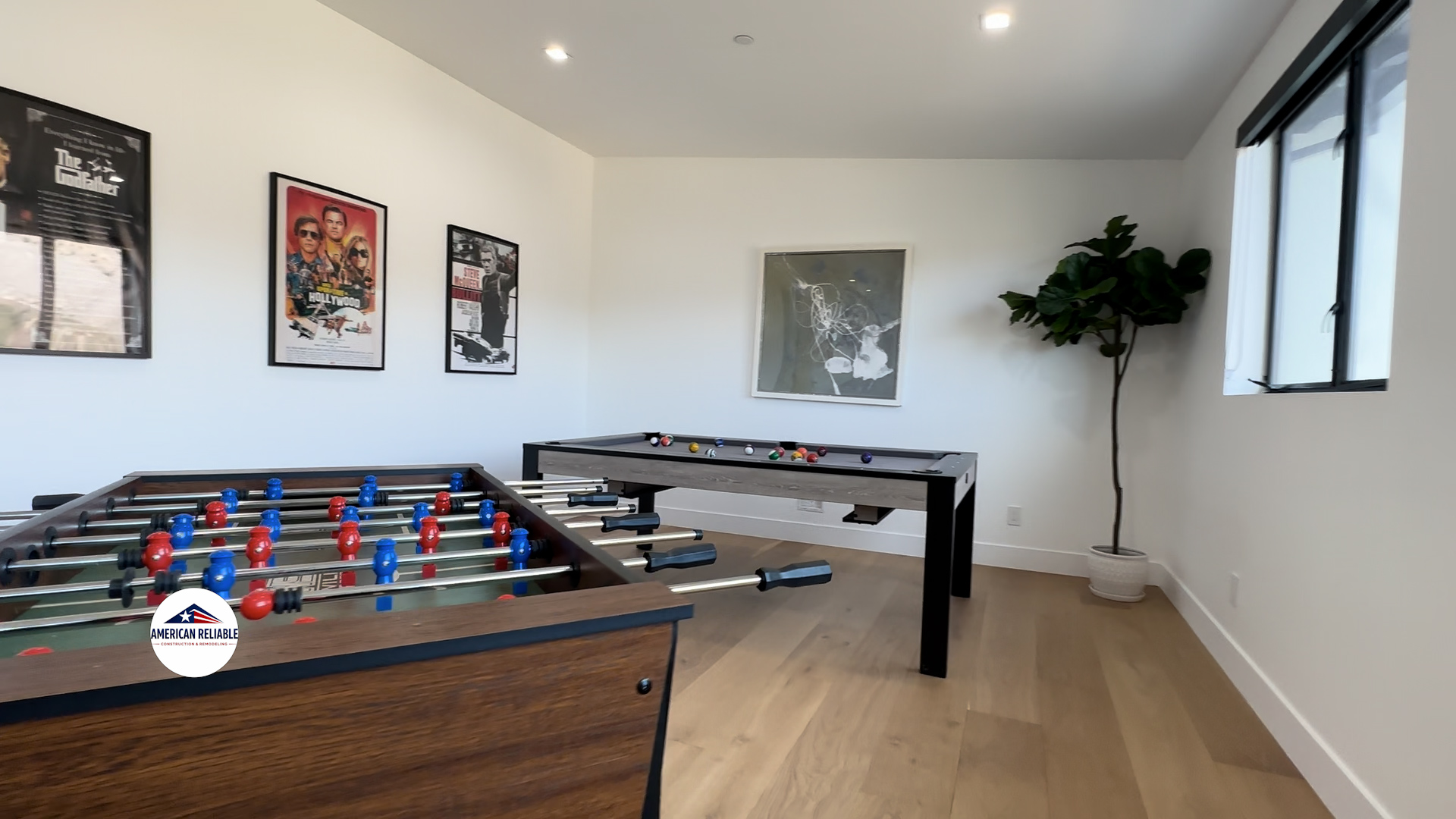 Game room with entertainment and natural light
